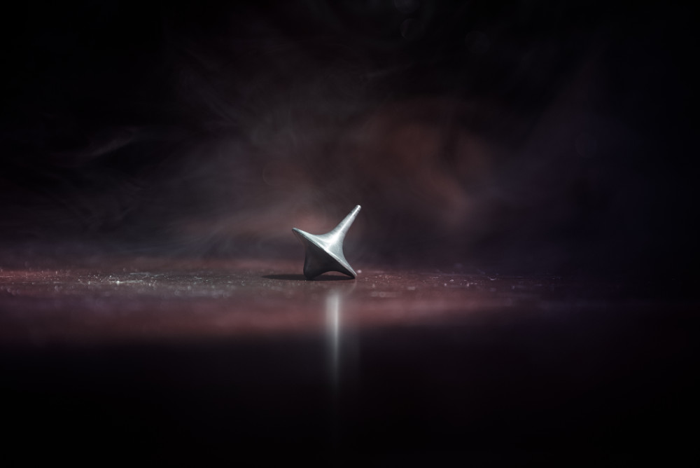The spinning top (Dom Cobb's totem) from the movie Inception