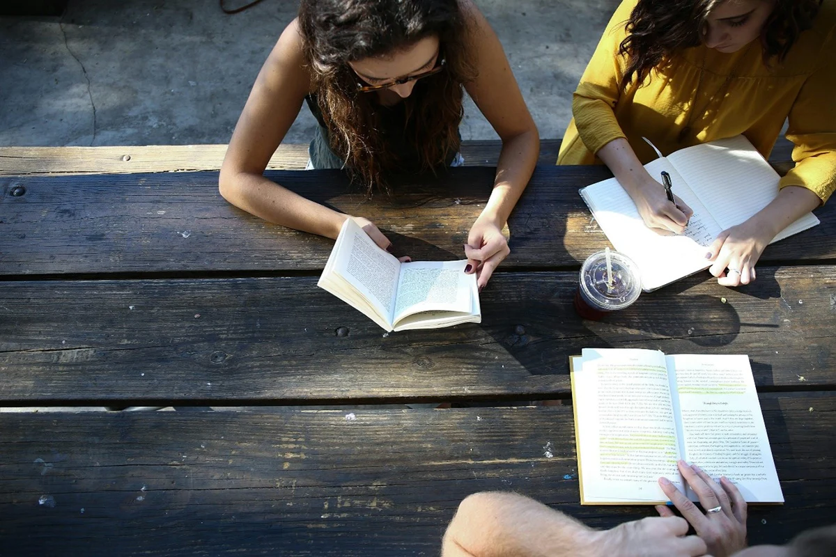 A group of students studying together outside