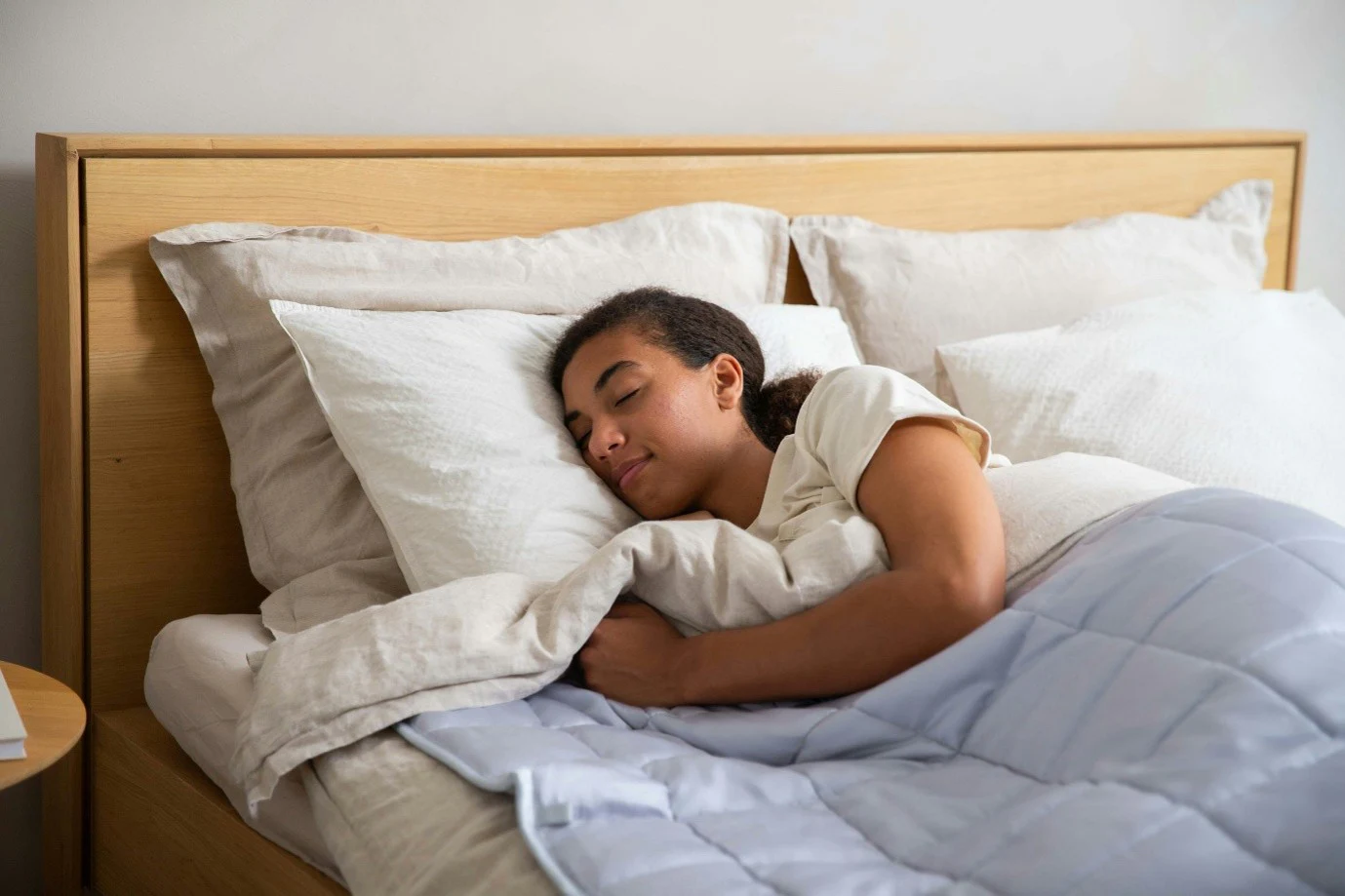 A student asleep in bed